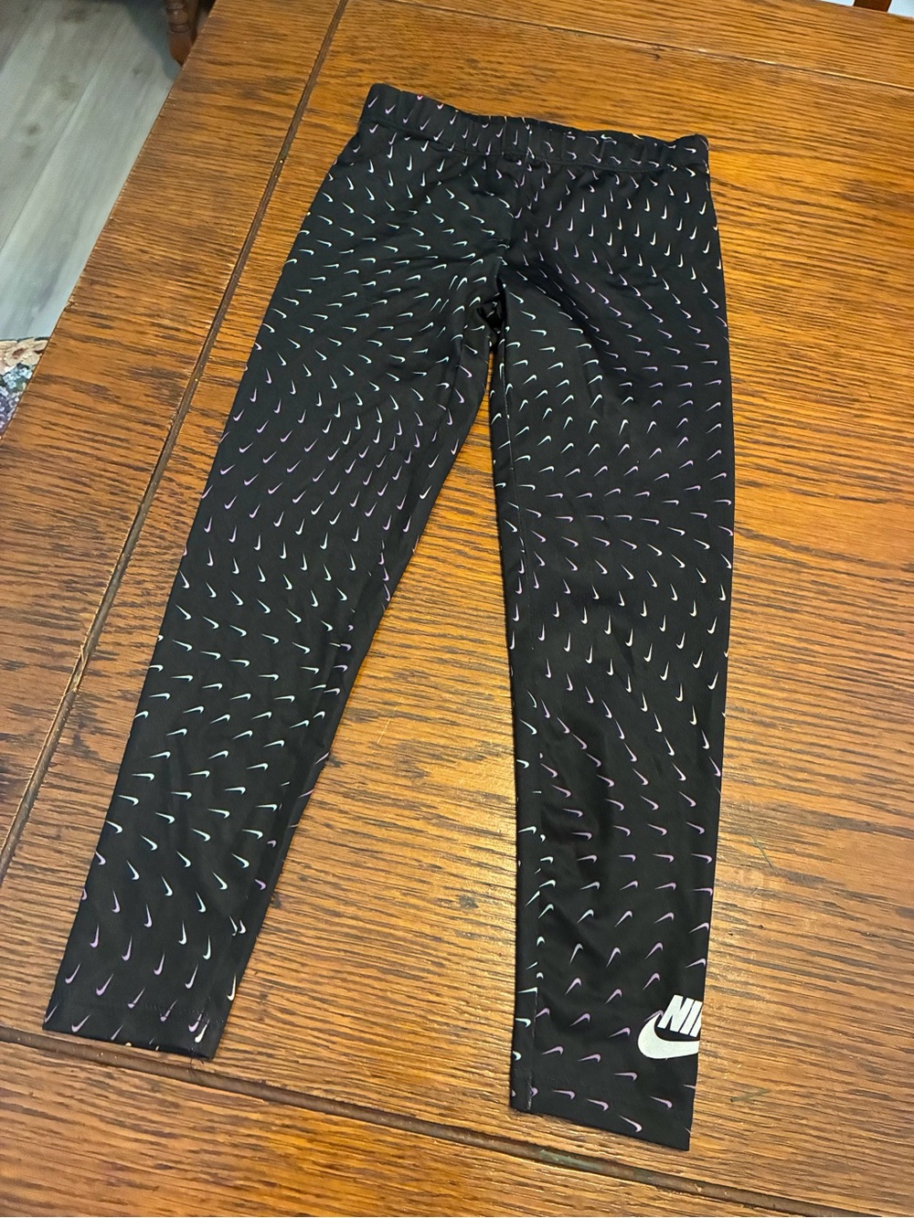 Nike Kids Black Leggings with Purple Accent Swooshes